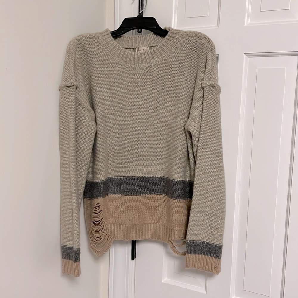 Frayed distressed boutique sweater